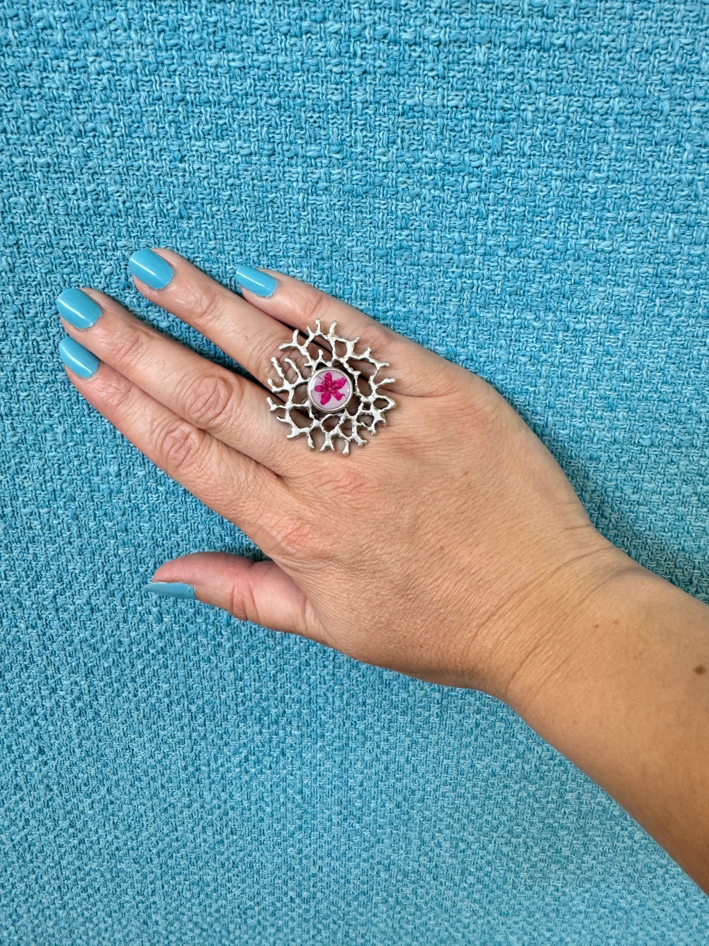 Coral ring with pink flower