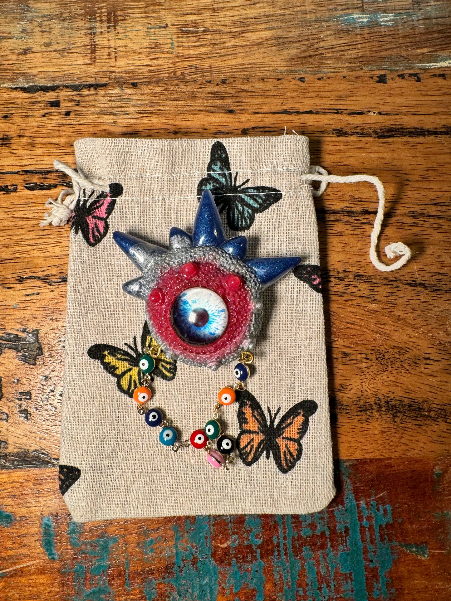 Goth brooch,edgy unique handmade brooch in resin, monster eye jewelry, blue, pink and silver. Model Spiky.