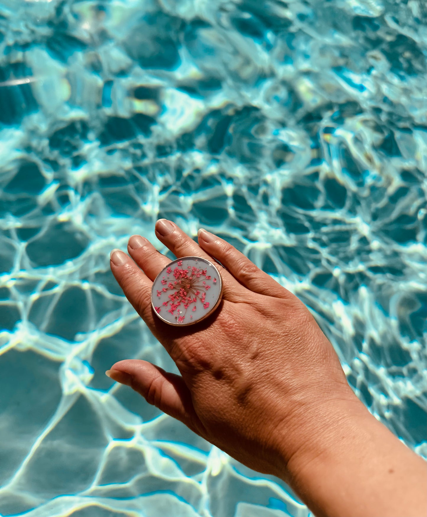 Large round ring with pink flowers