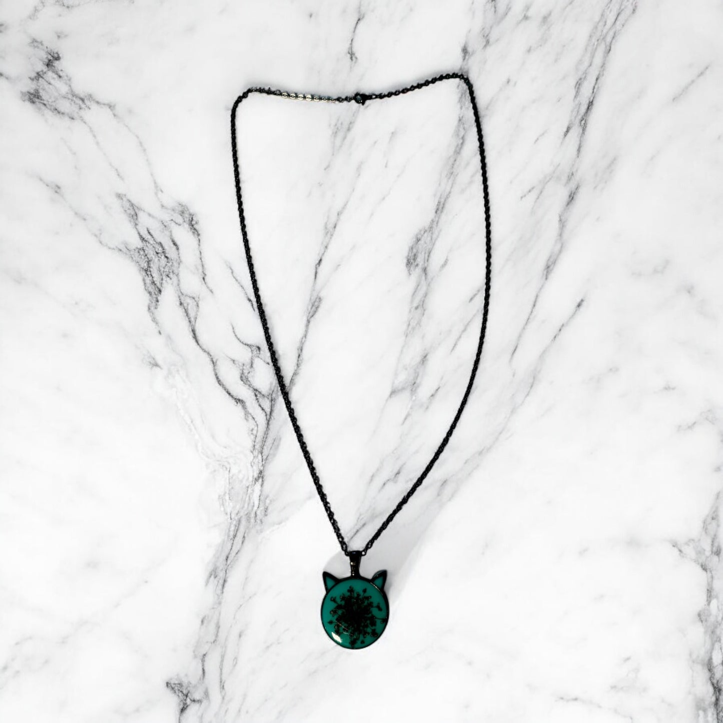 Cat head necklace, turquoise/green with black flower