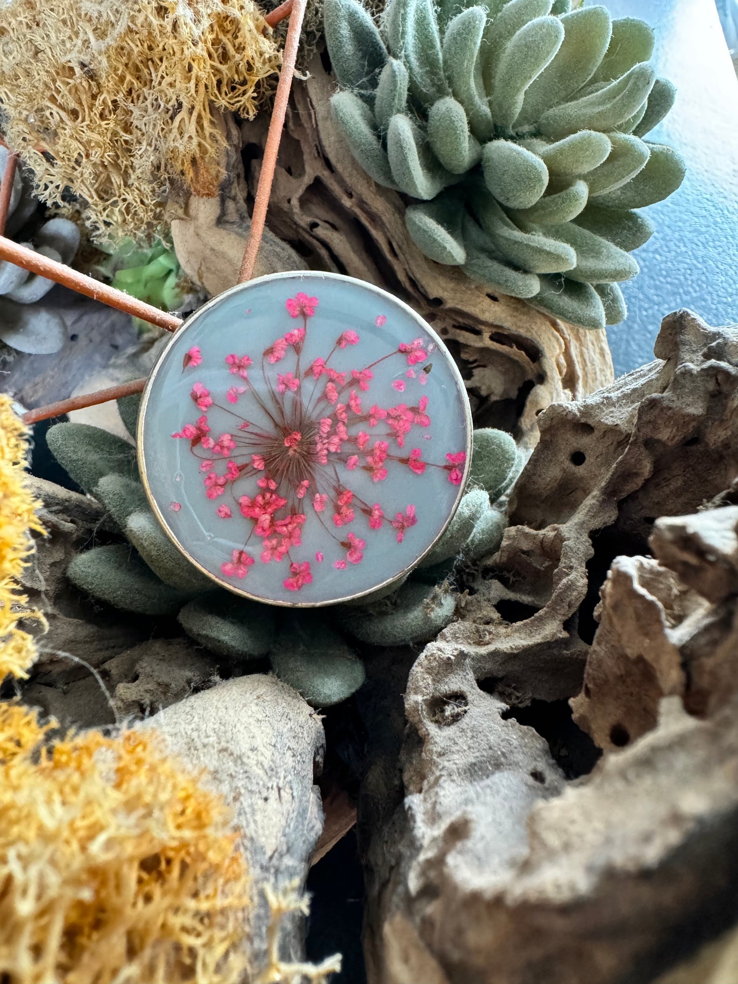 Large round ring with pink flowers