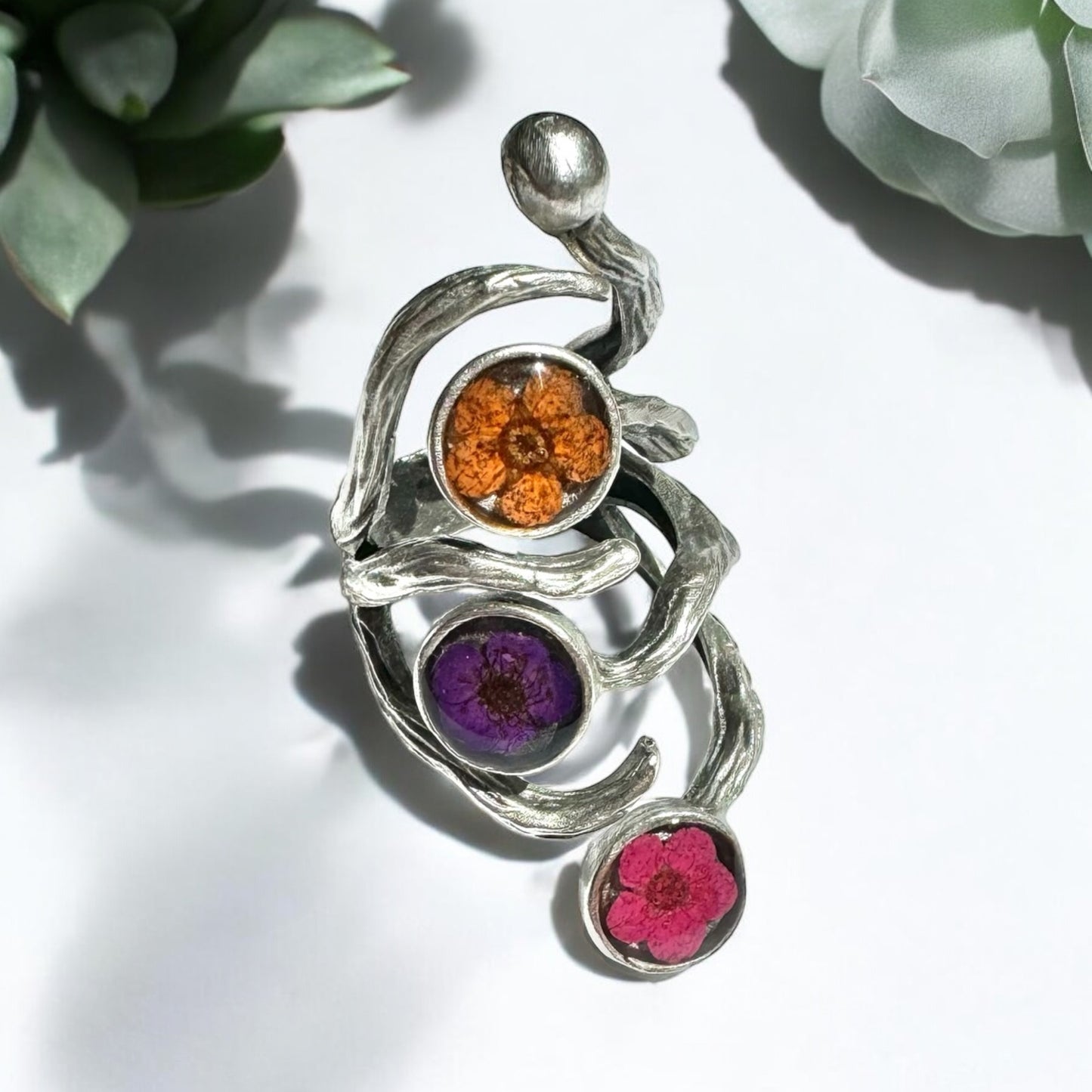 The roots ring with three flowers