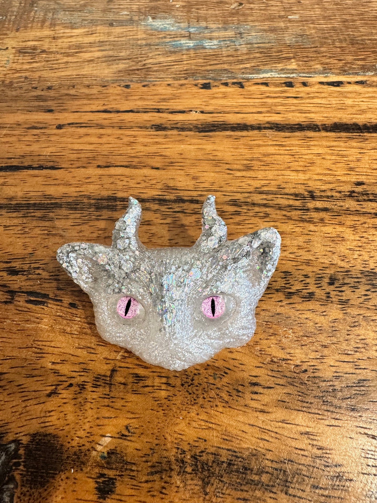 White and silver cat brooch with horns