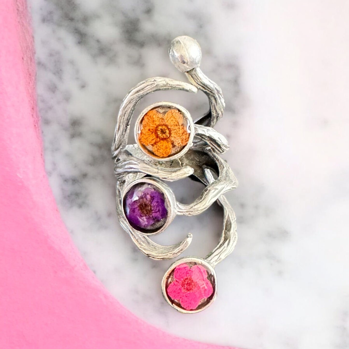 The roots ring with three flowers