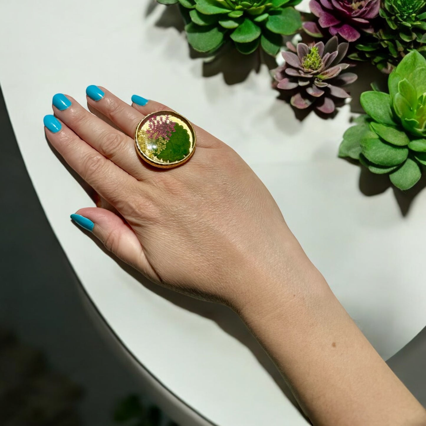Oversized round ring with Queen Anne’s lace and leaf