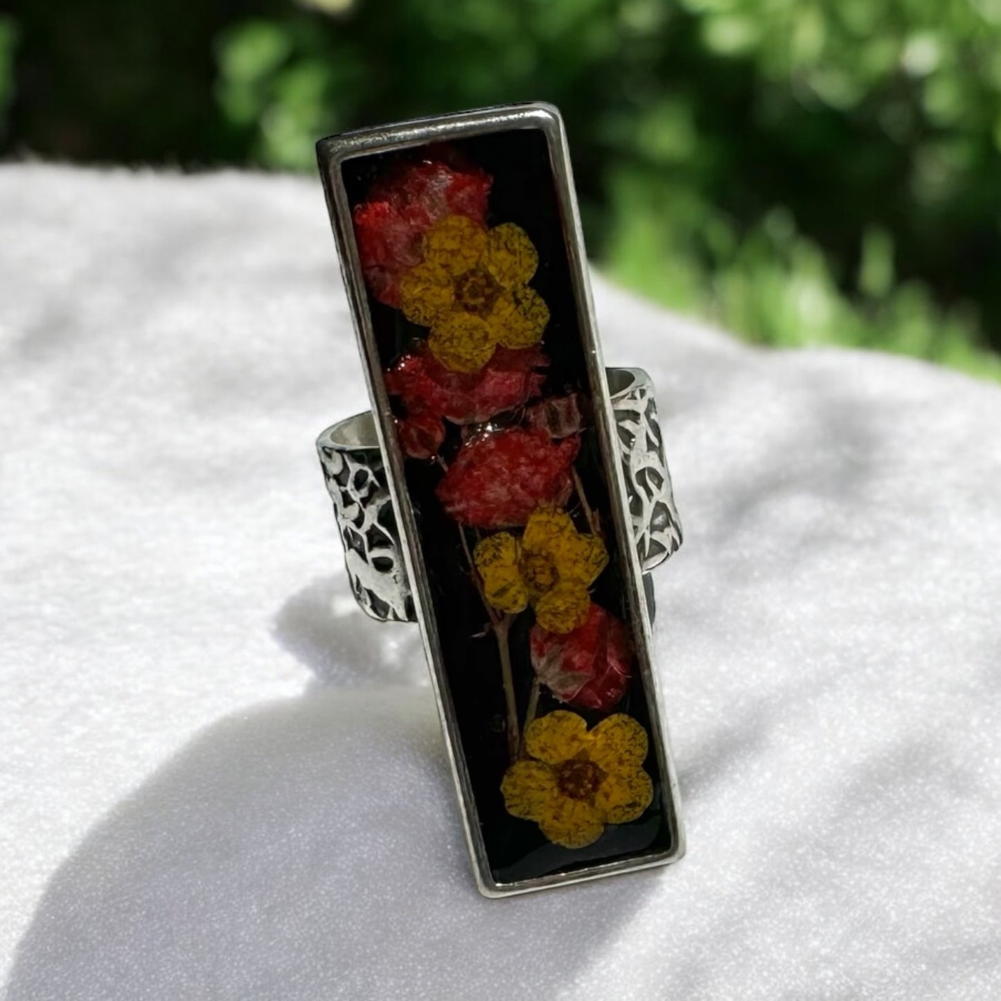 Rectangular long silver ring with flowers