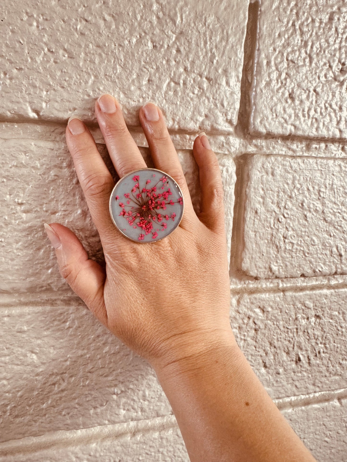 Large round ring with pink flowers