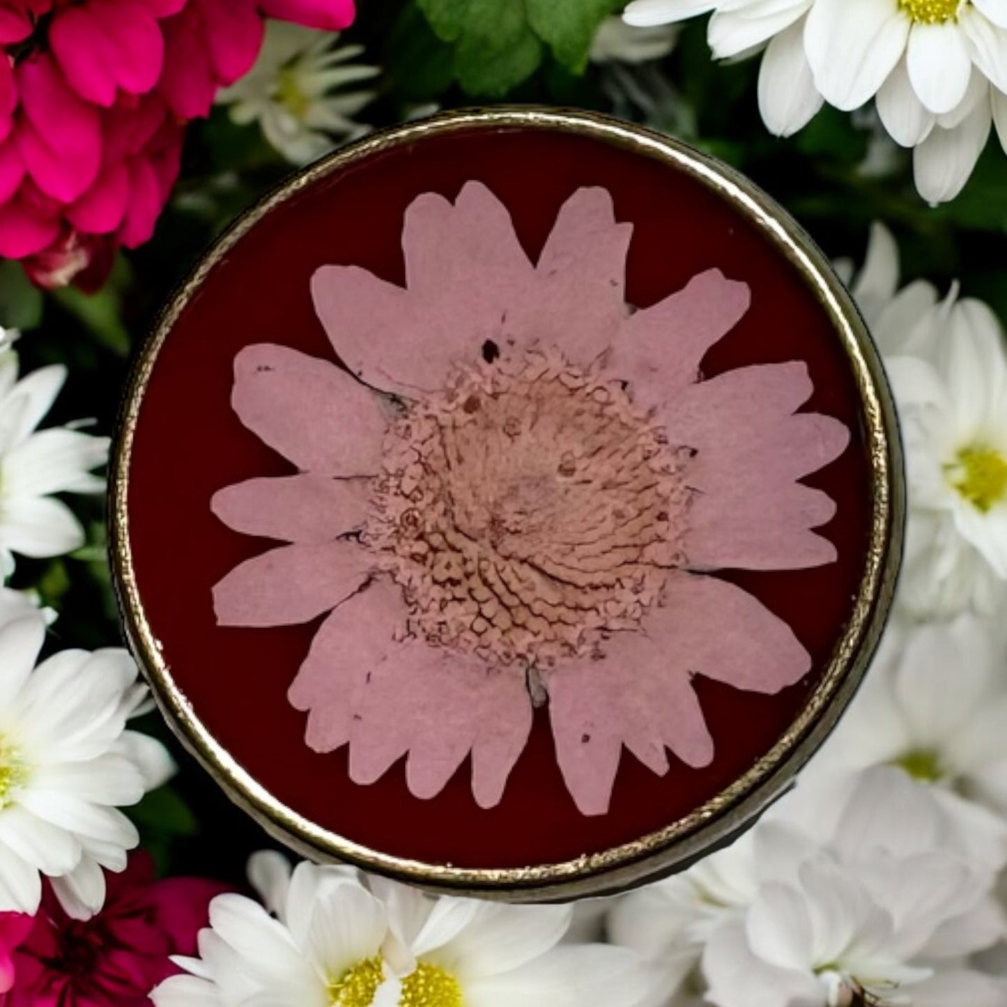 Round bronze ring with light pink daisy