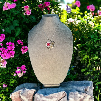 Large heart shape necklace with pink daisy, white Queen Anne lace and watch gear