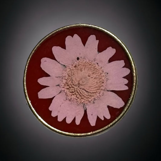 Round bronze ring with light pink daisy