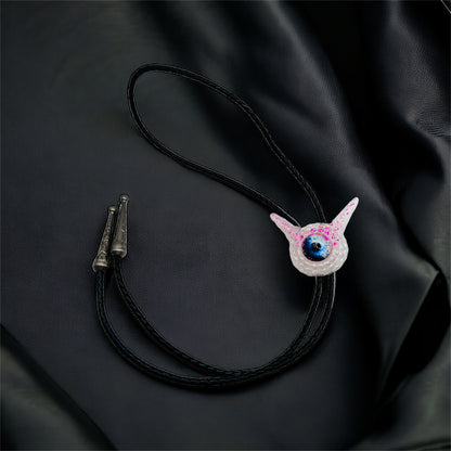 Monster bolo tie in white and pink. Model Pointy.