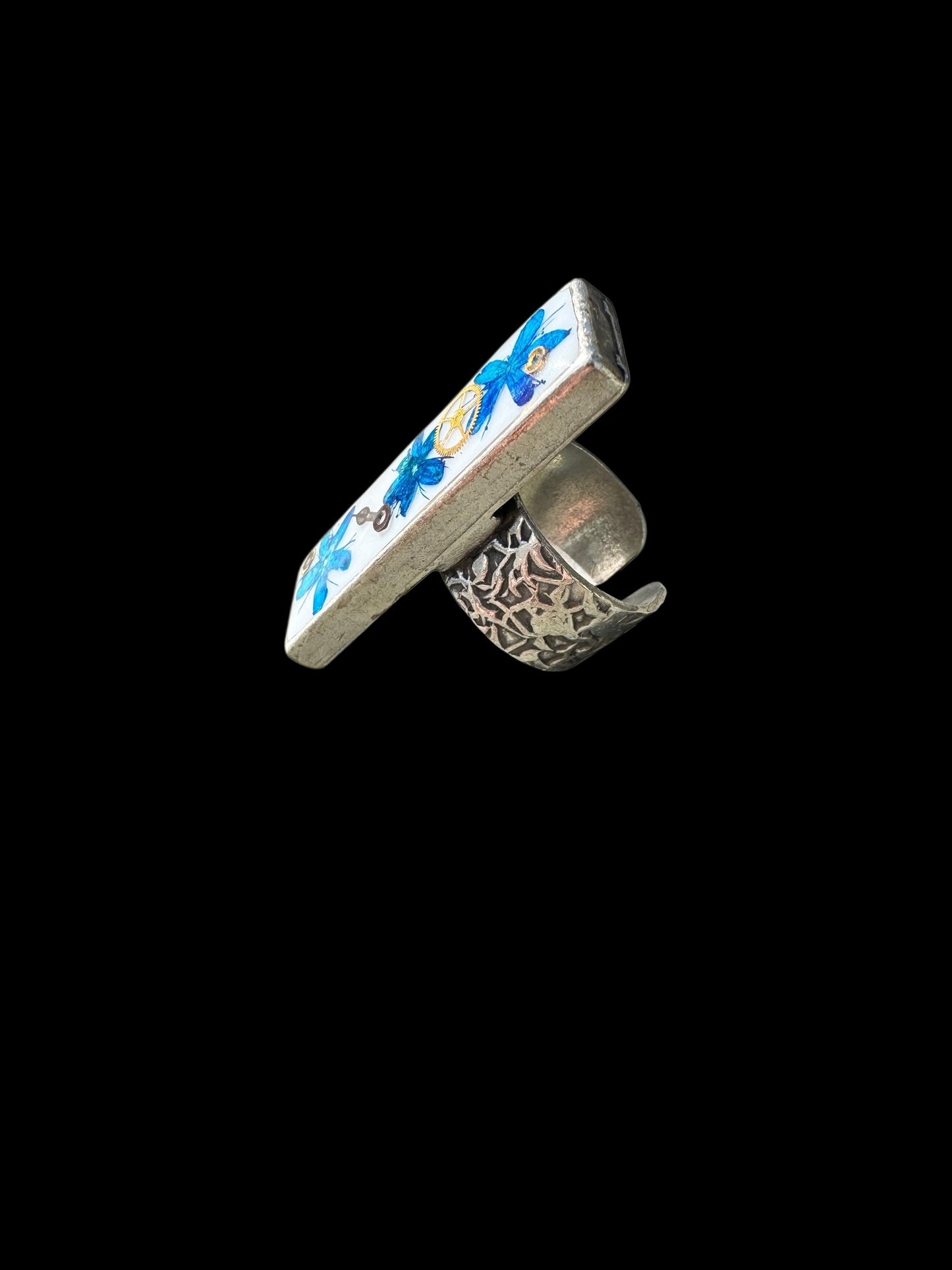 Rectangle ring with blue flowers and watch gears