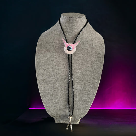 Monster bolo tie in white and pink. Model Pointy.