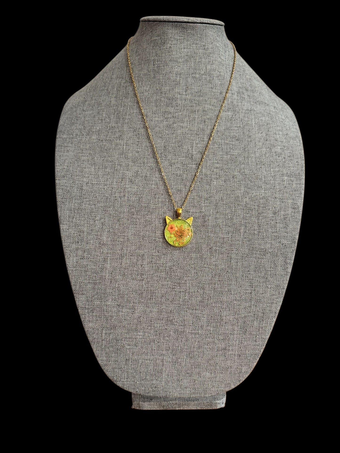 Cat head necklace with orange flowers