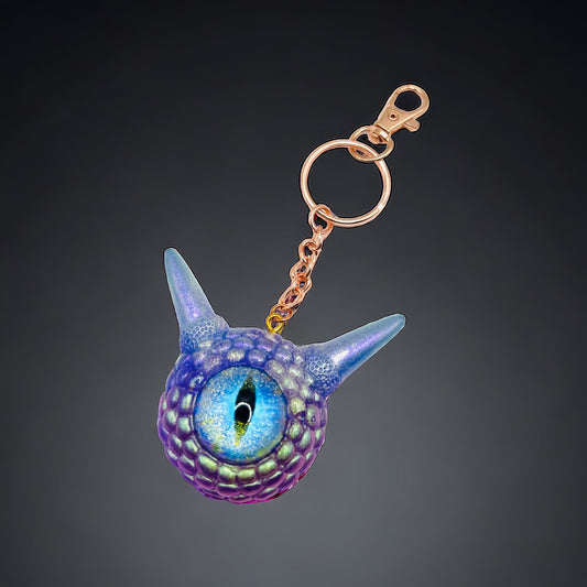 Monster Purple Glitter keychain. Model Pointy.