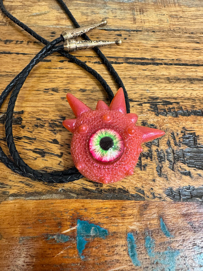Monster bolo tie in pink. Model Spiky.