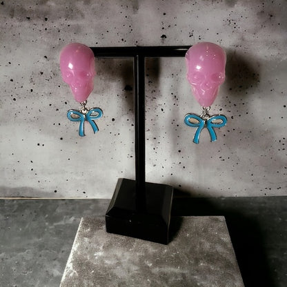 Bubblegum Skull with blue bow and silver metal earrings studs