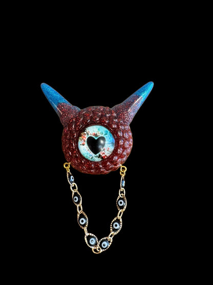 Monster brooch in red and blue. Model Pointy.