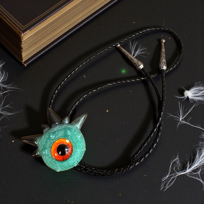 Monster bolo tie in green and black. Model Spiky.