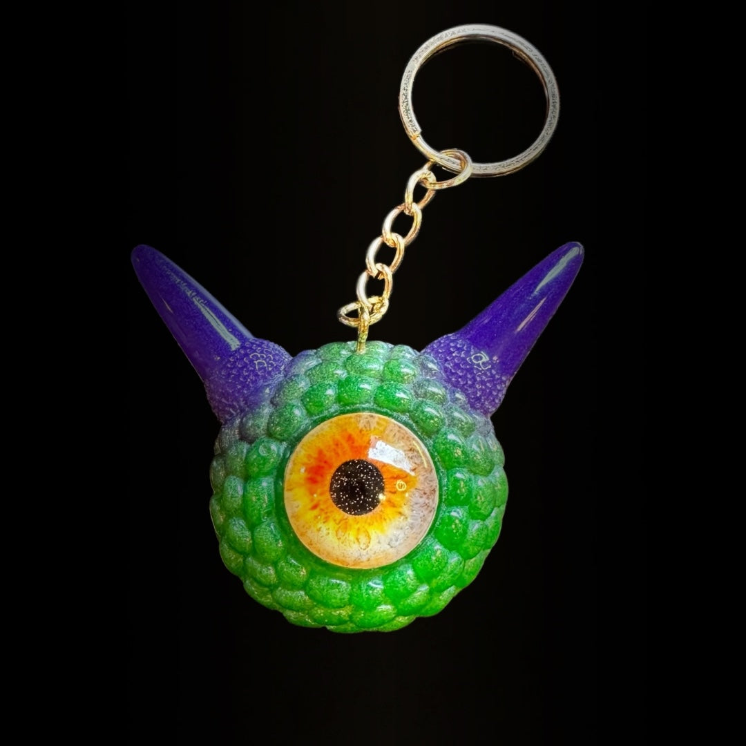 Monster green and purple keychain. Model Pointy.