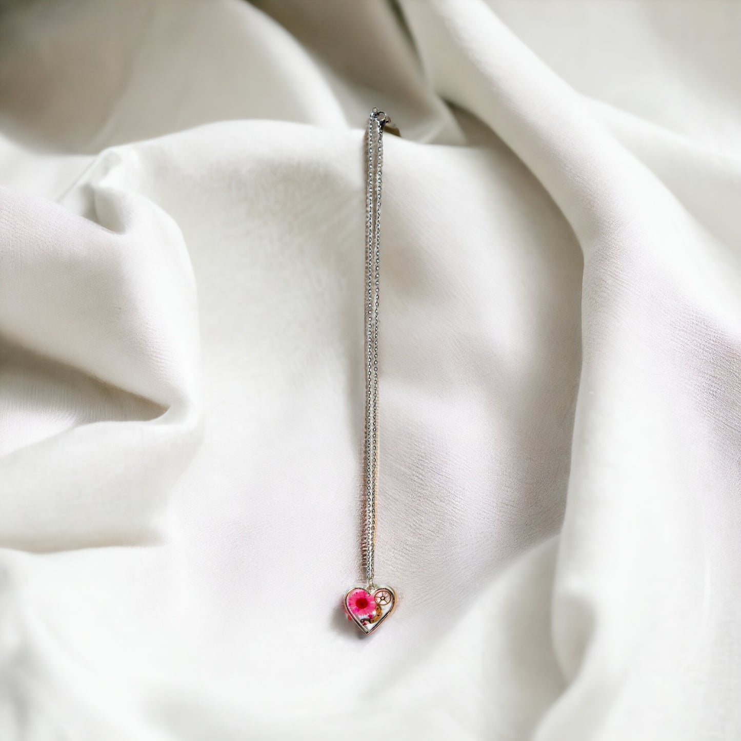 Heart necklace with pink chrysanthemum and watch parts