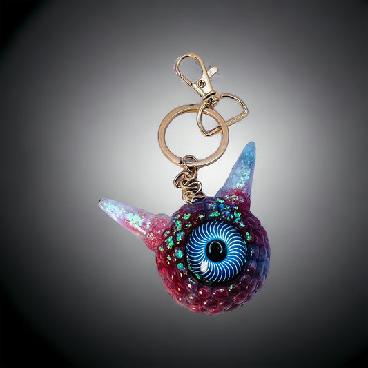 Monster Eye red and blue keychain. Model Pointy.