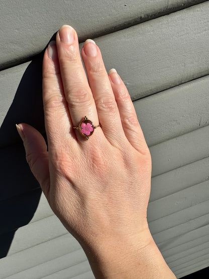 Minimalist gold ring with pink flower