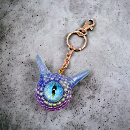 Monster Purple Glitter keychain. Model Pointy.