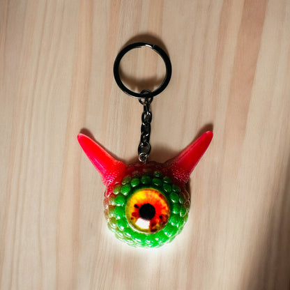 Monster green and pink kawaii keychain. Model Pointy.