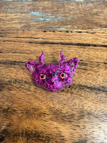Pink cat brooch with horns