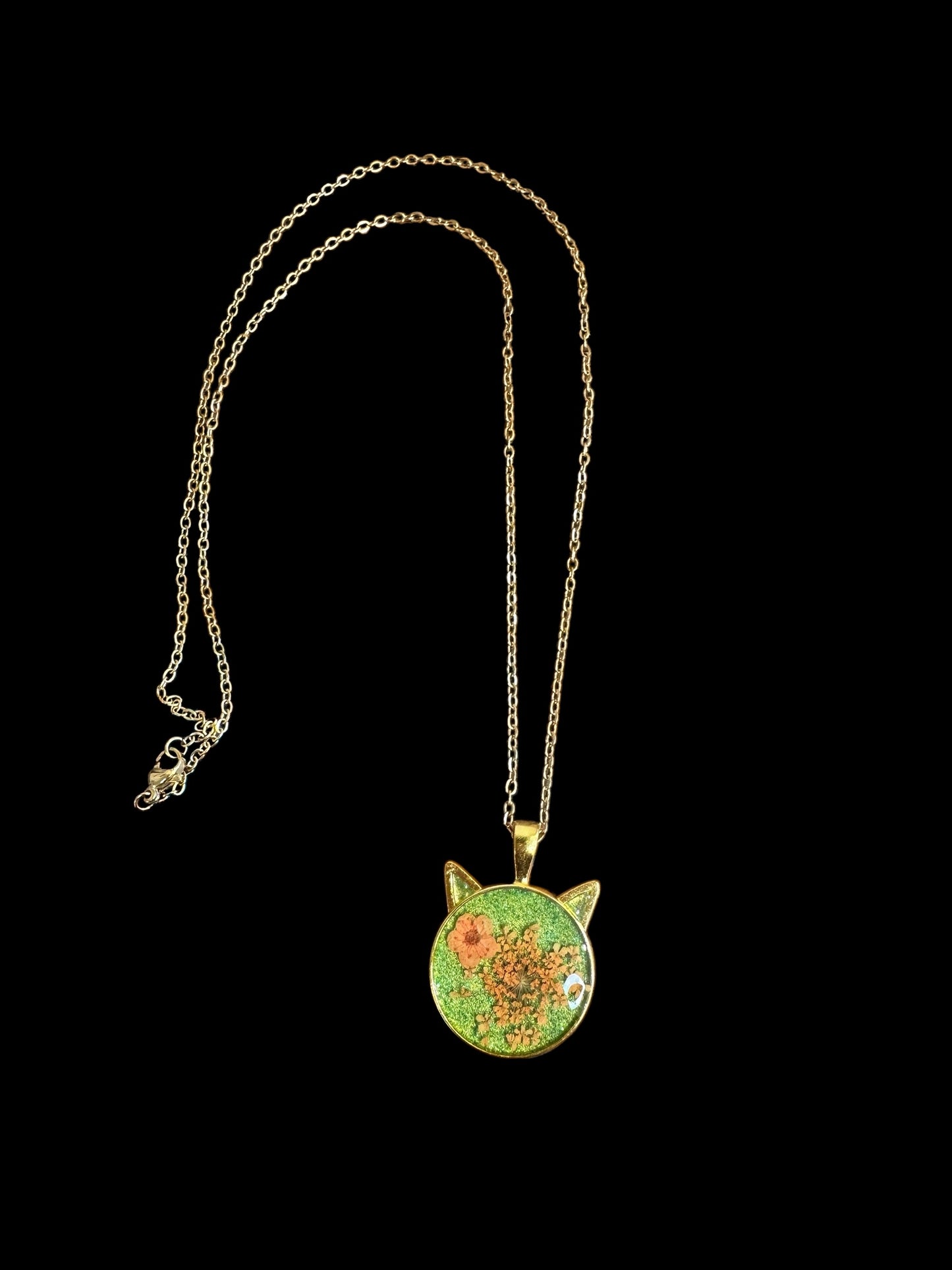 Cat head necklace with orange flowers