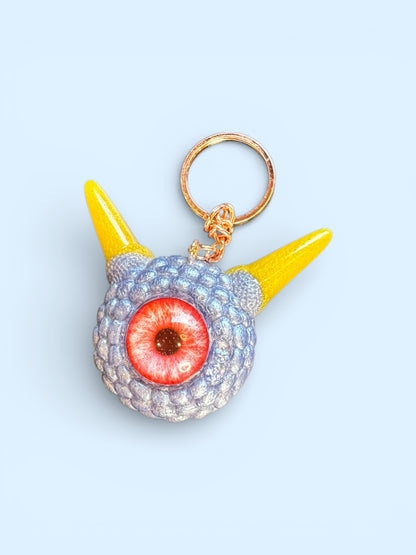 Monster grey purple and yellow keychain. Model Pointy.