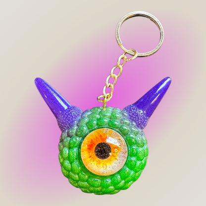 Monster green and purple keychain. Model Pointy.