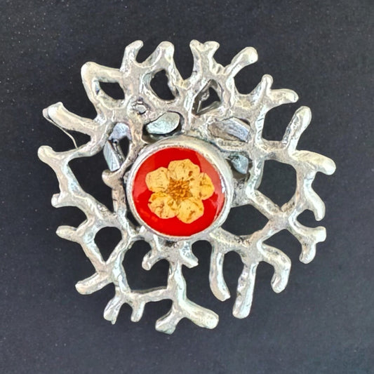 Coral ring with yellow flower