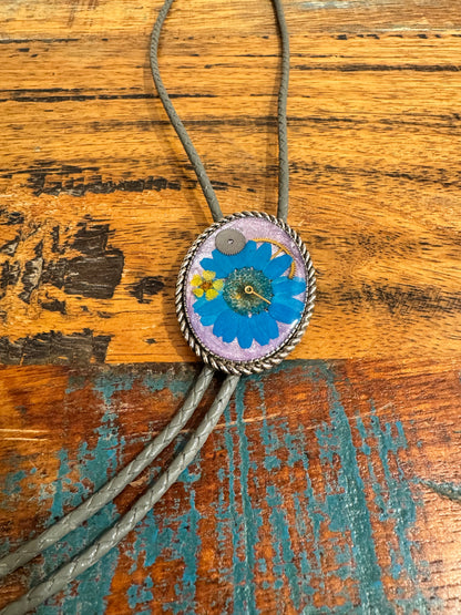 Bolo tie, blue daisy flower and watch gears