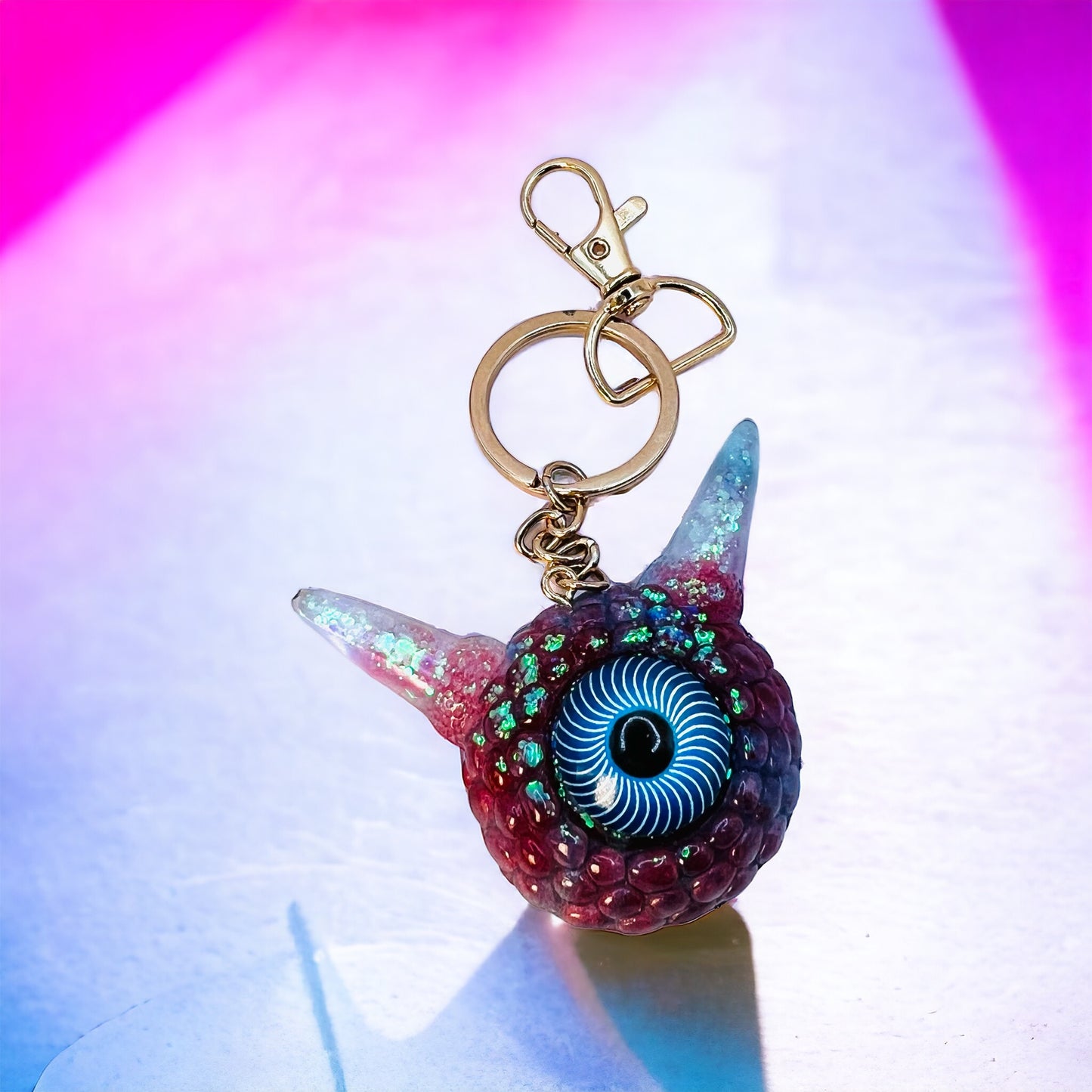 Monster Eye red and blue keychain. Model Pointy.