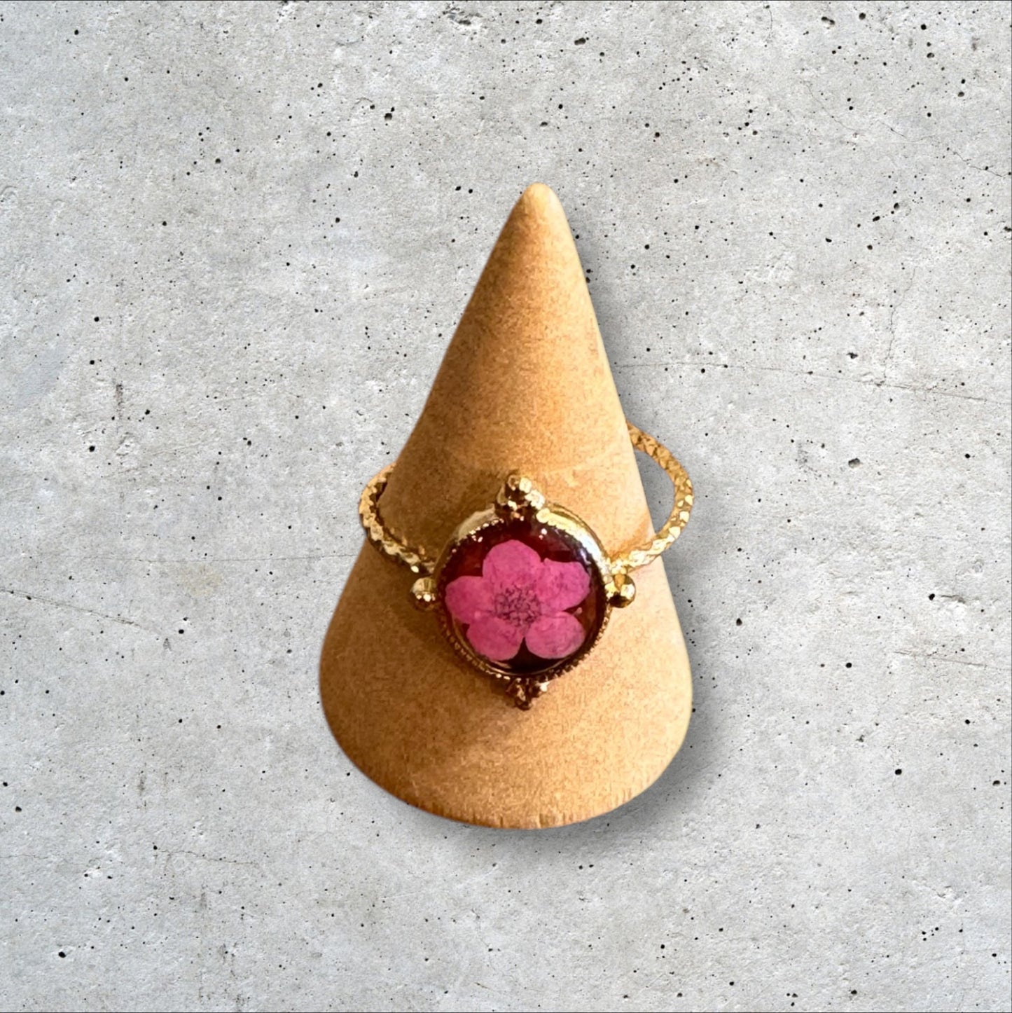 Minimalist gold ring with pink flower