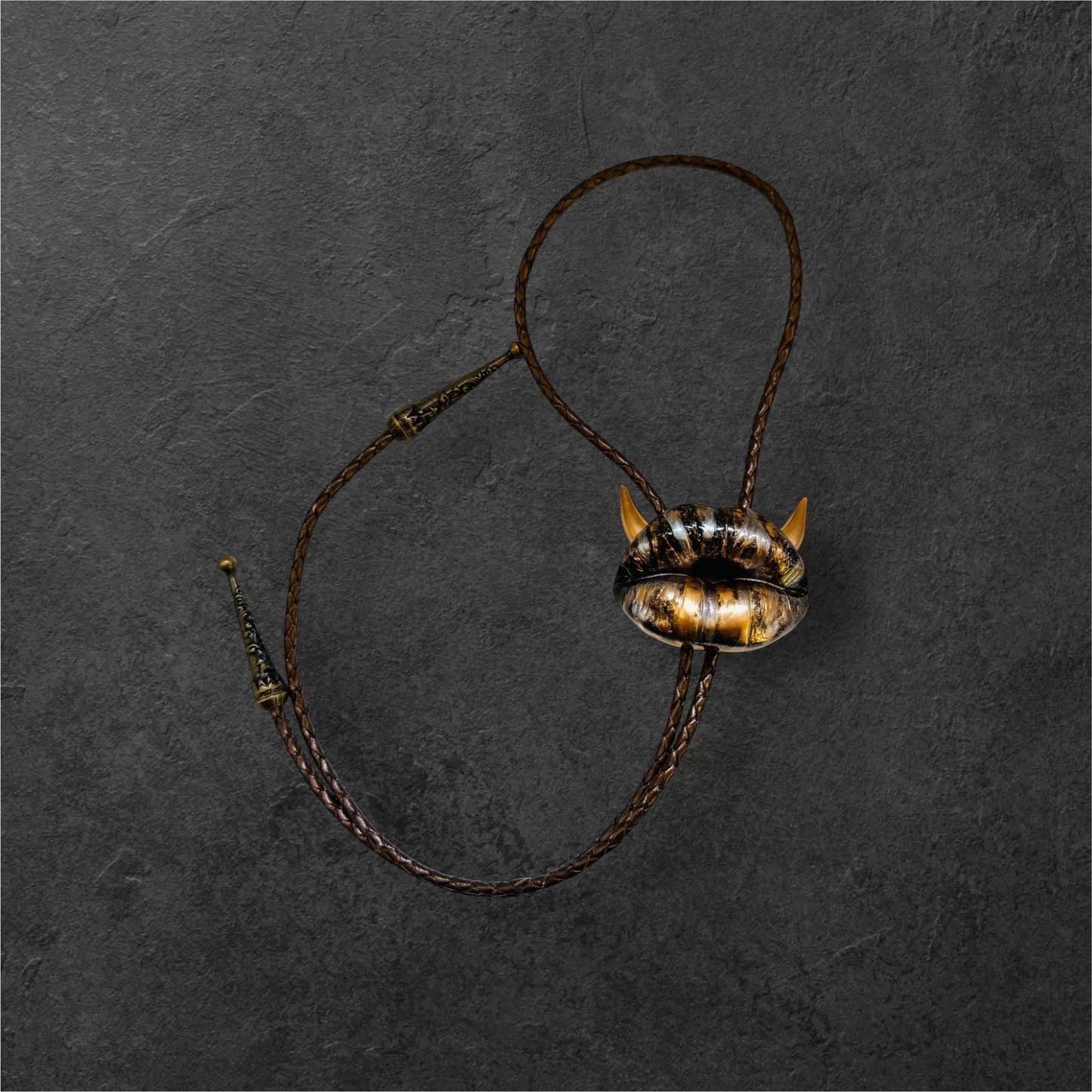 Bolo tie with horns, black, copper and silver lips, handmade resin jewelry