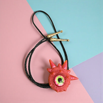 Monster bolo tie in pink. Model Spiky.