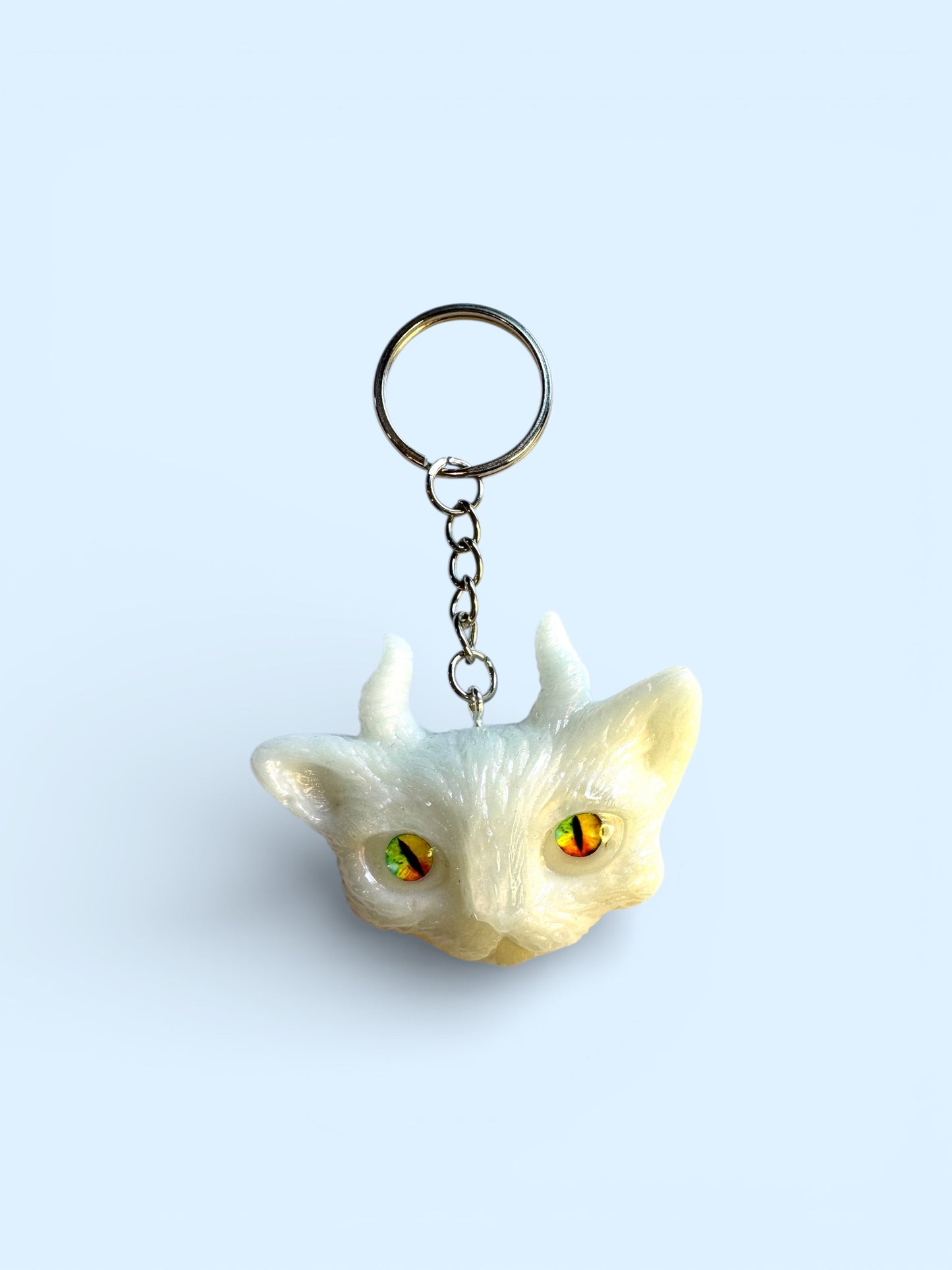 White cat with horns keychain