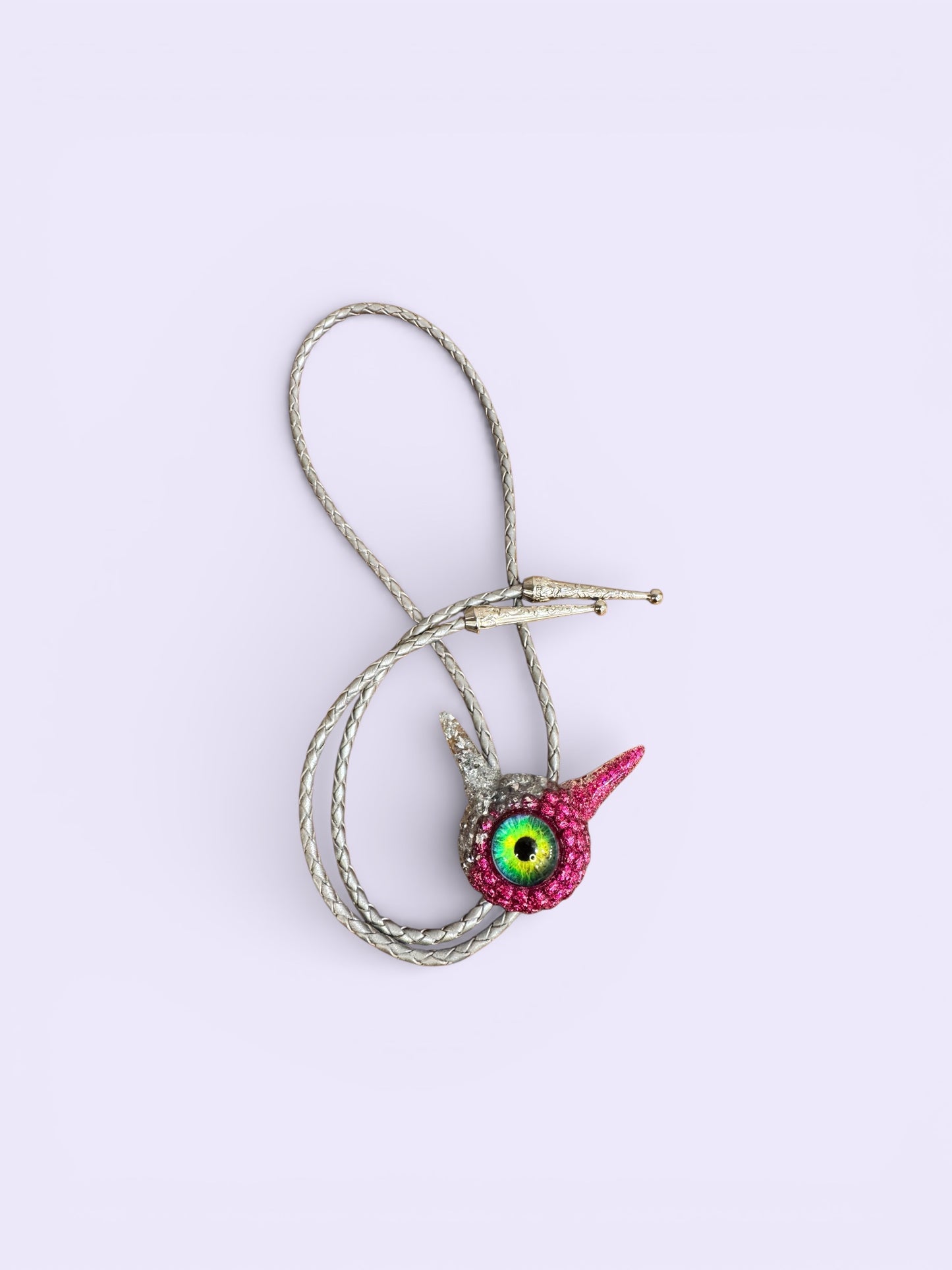 Monster bolo tie in silver and pink. Model Pointy.