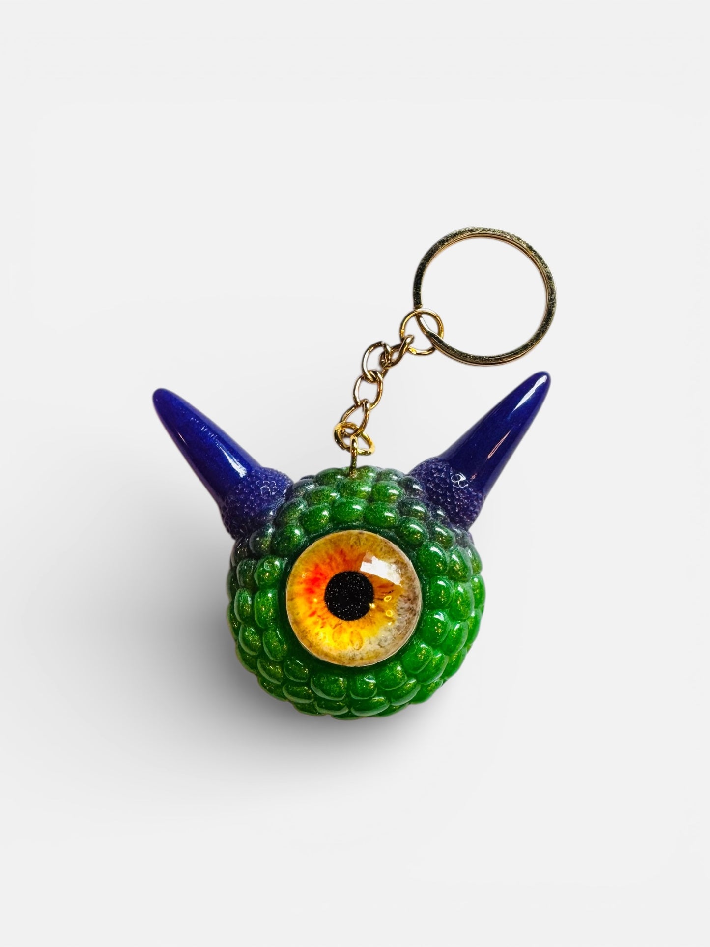 Monster green and purple keychain. Model Pointy.