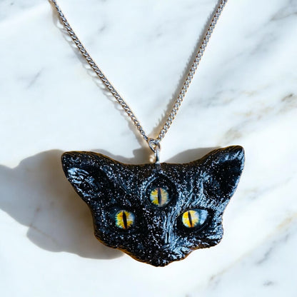 3 eyed cat head necklace, black with silver glitter