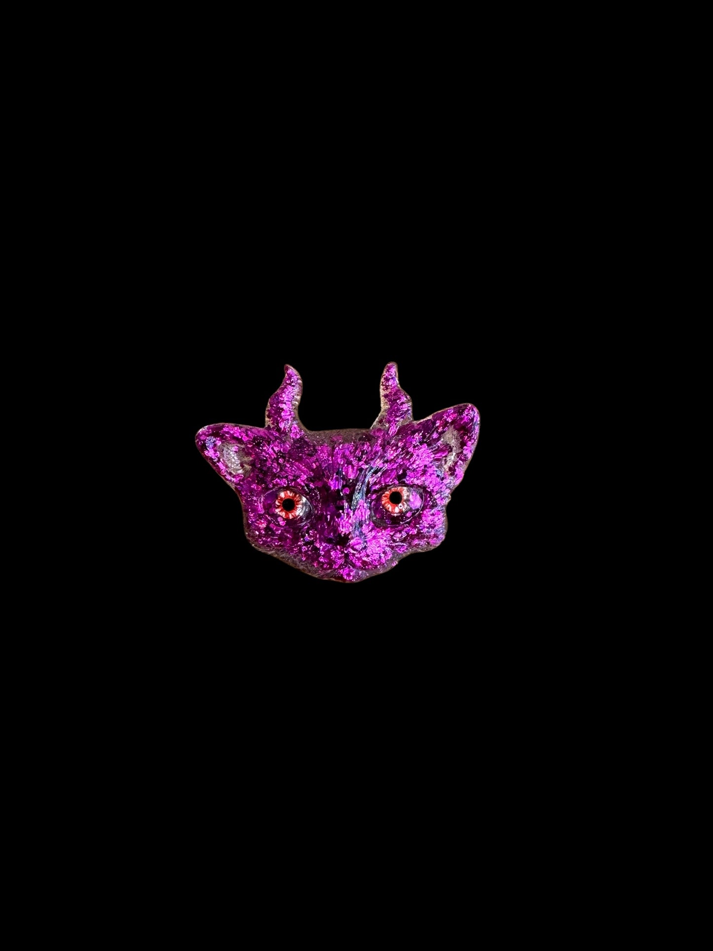 Pink cat brooch with horns