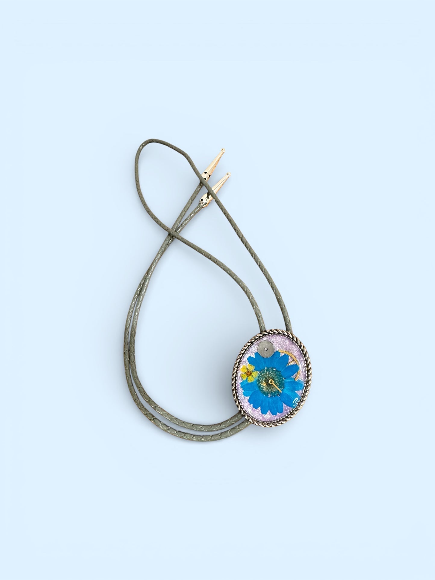 Bolo tie, blue daisy flower and watch gears