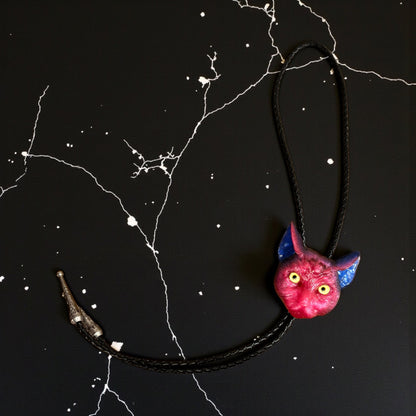 Cat bolo tie in pink and blue.