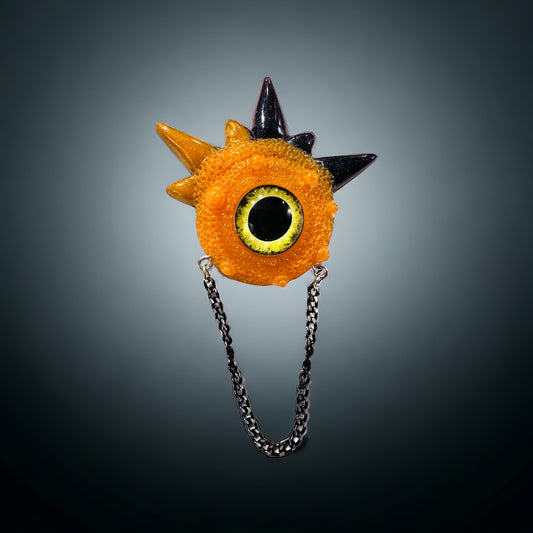 Handmade brooch, orange and black monster brooch, pastel goth jewelry, evil eye brooch in resin,creepy cute,spooky jewelry, kawaii brooch, unique brooch. Model Spiky.