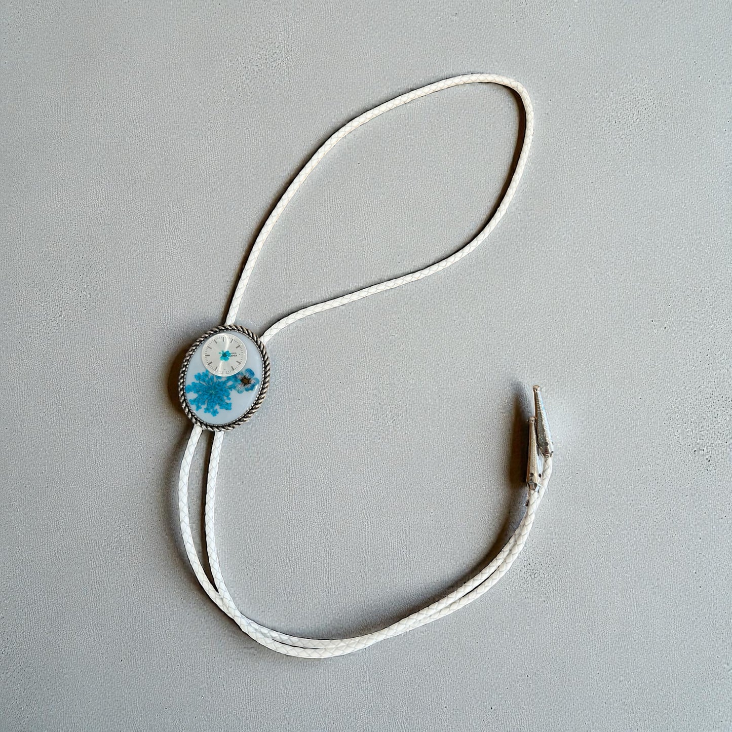 Bolo tie, blue flowers and watch gears, handmade resin jewelry
