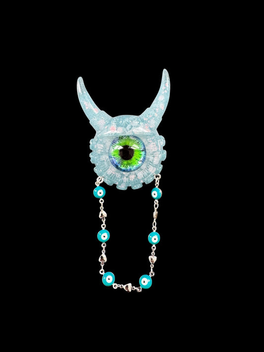 09/05 Monster brooch with chain. Model Vicky.
