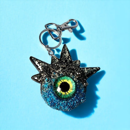 Blue glitter monster keychain. Model Spiky.